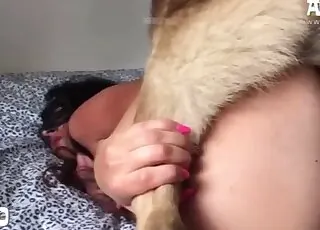 Nasty masked chick getting bred by a dog in short clip