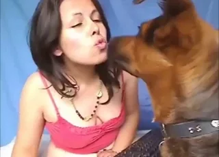 Brunette amateur woman webcam sex with dog in her crotch